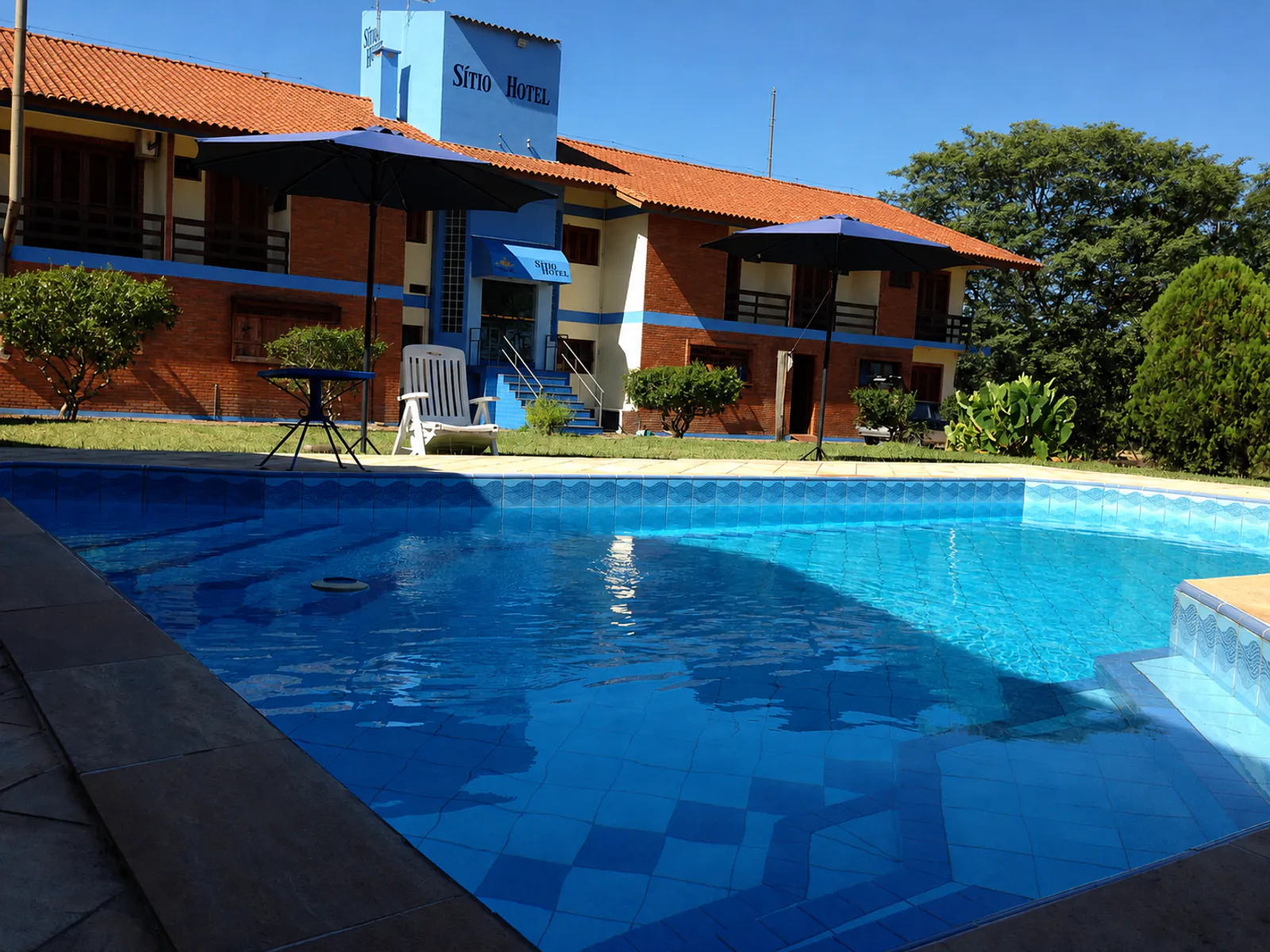Piscina e área de lazer do Sítio Hotel & Eventos em São Pedro do Sul